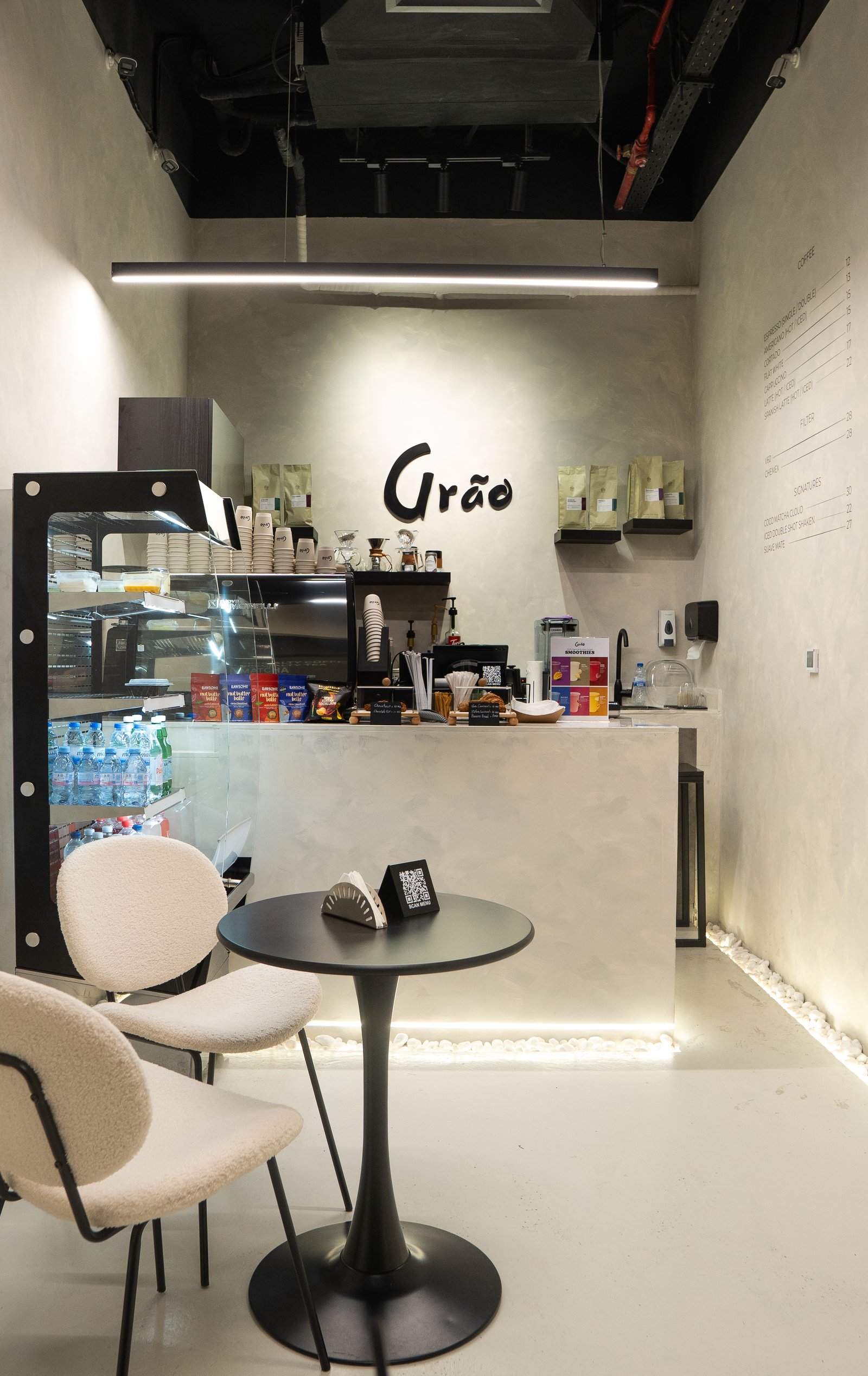 Inside Grāo — micro-cement coffee bar in Al Jaddaf